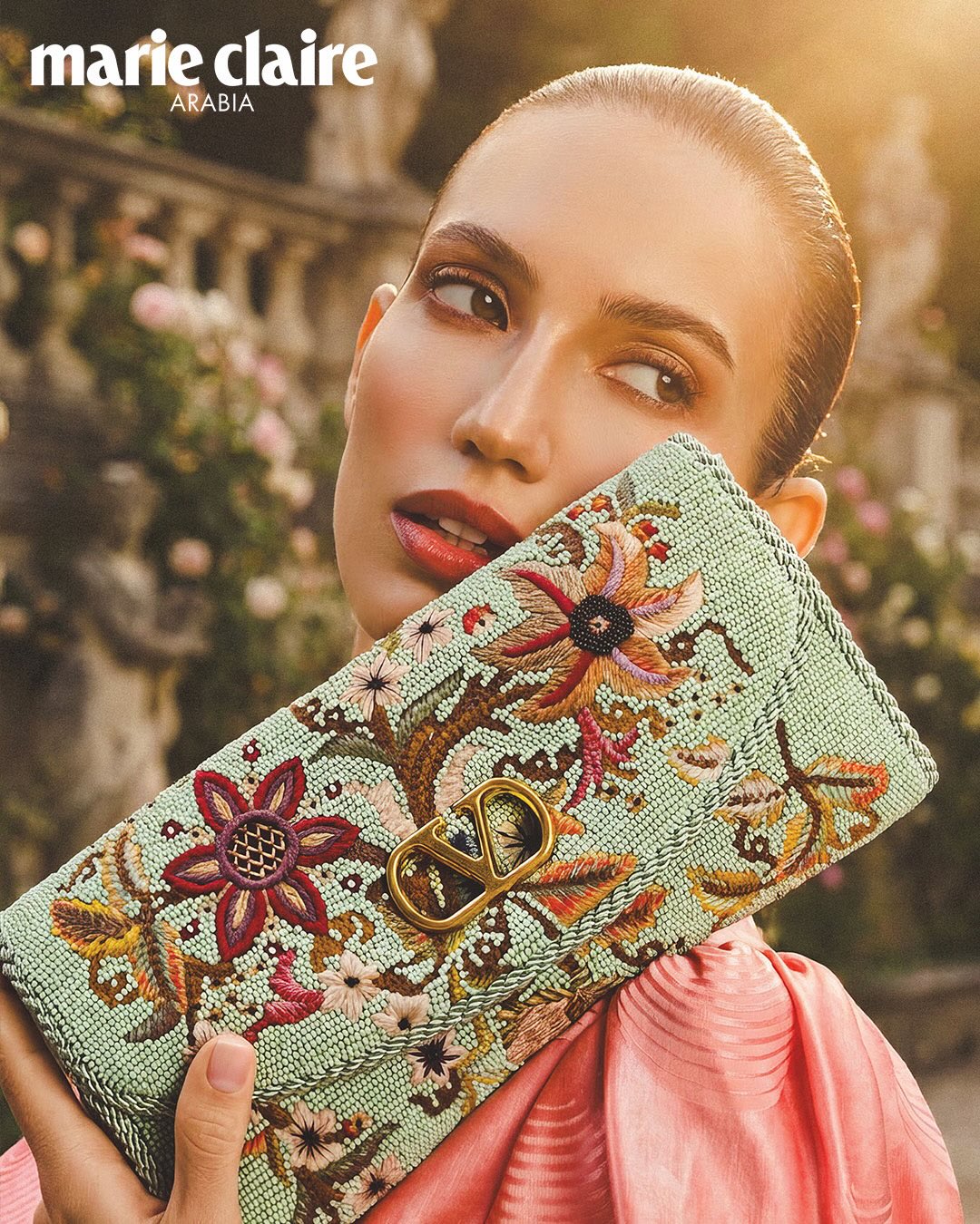 Marie Claire editorial of an ANT model with an embroidered bag