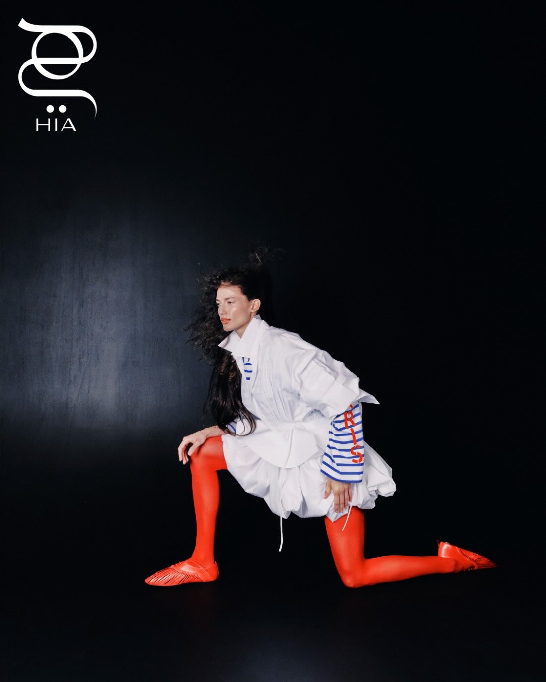 HIA magazine editorial of an ANT model in white and red